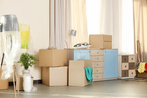 House movers working near residential properties in Brent Cross