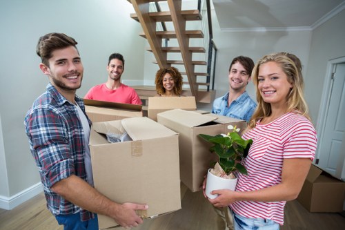 Moving van and packed boxes for home moves in Brentcross