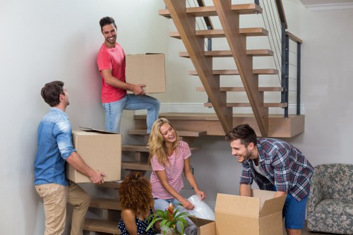 Professional removals planning in Brentcross with moving boxes and a van
