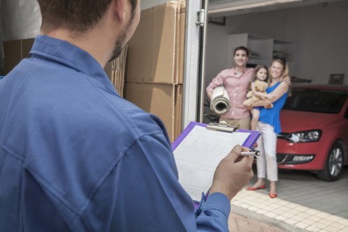 Loading furniture into a van for a Brent Cross move