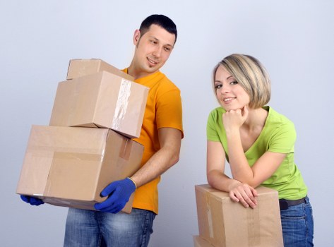 Professional movers loading furniture during a Brentcross relocation