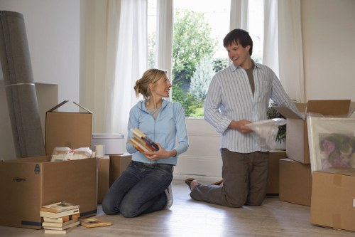 Professional movers handling furniture for same day removal