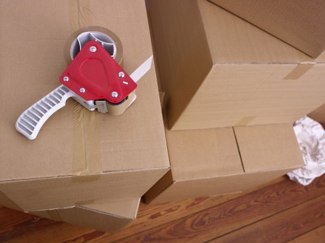 Experienced movers handling furniture and boxes during a Brentcross relocation